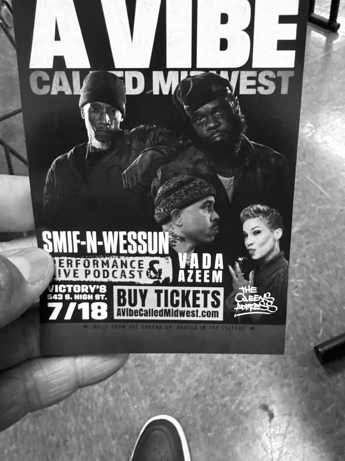 AVCM Vol. 3 flyer held up on the sidewalk during the first 500 flyer night