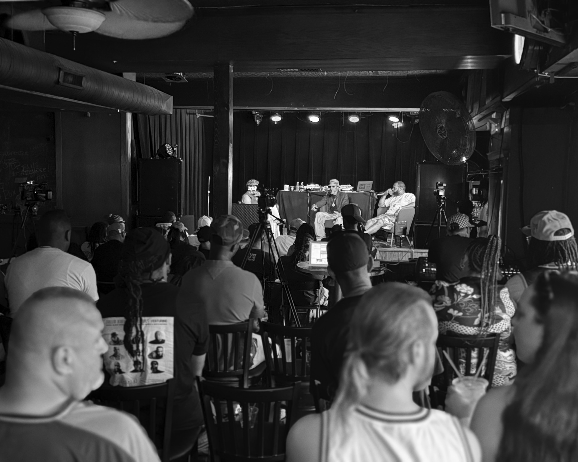 A live panel conversation at a packed nightlife venue